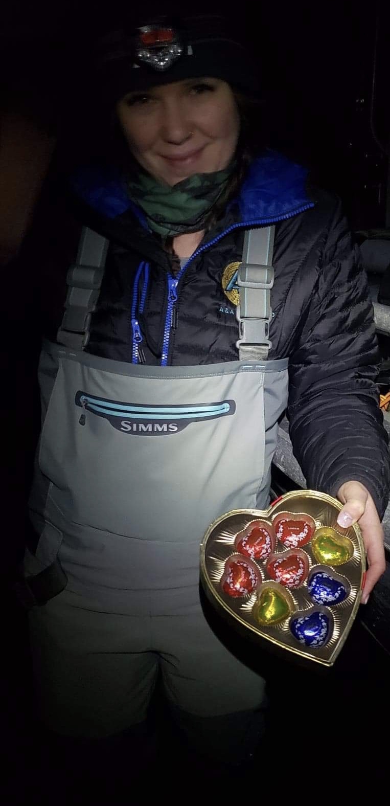 A lady holding valentines chocolates