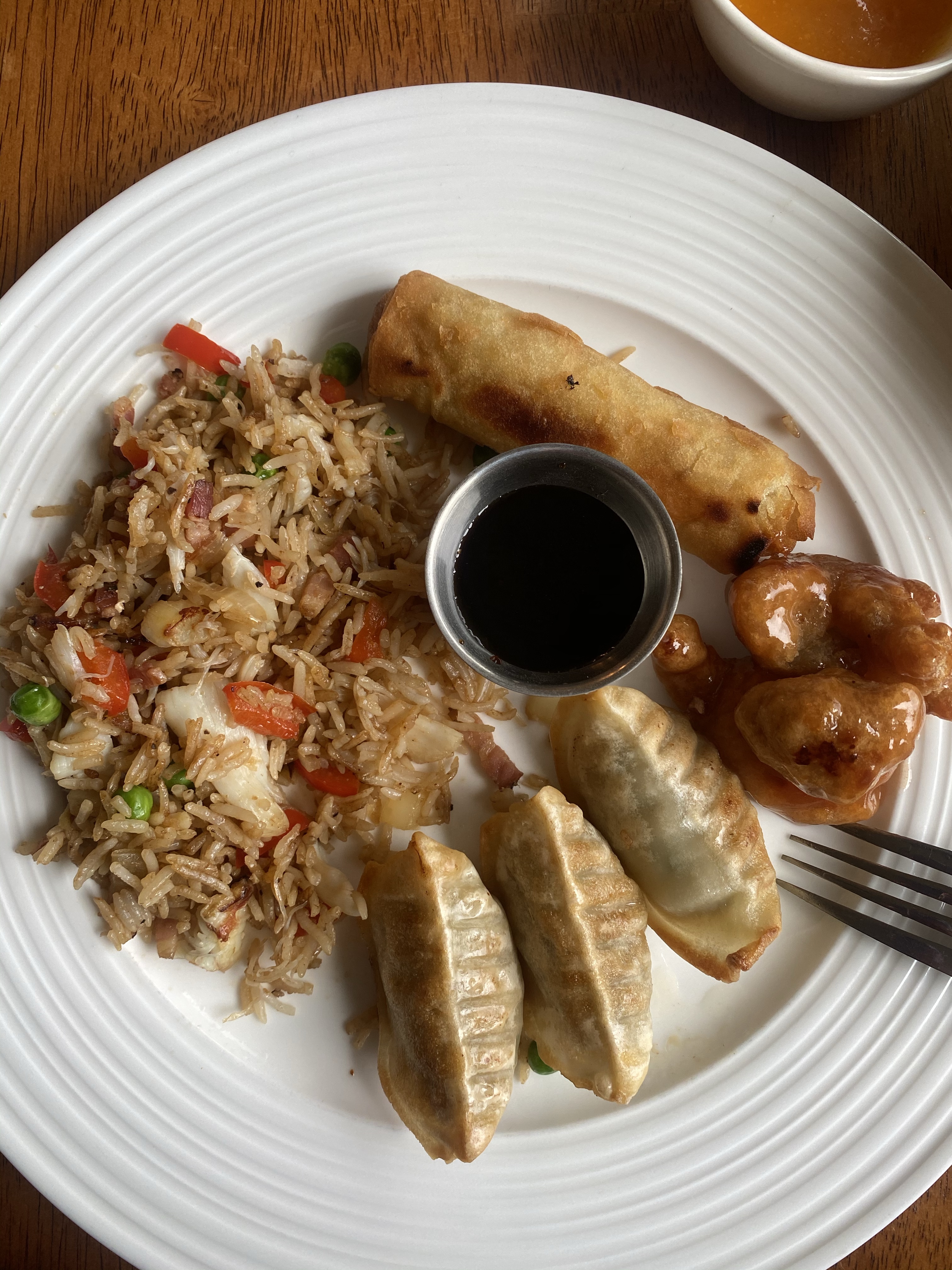 eets’m miyuup dił ḵ'a̱lmoos with frozen appetizers - spring rolls, sweet and sour pork, and potstickers.