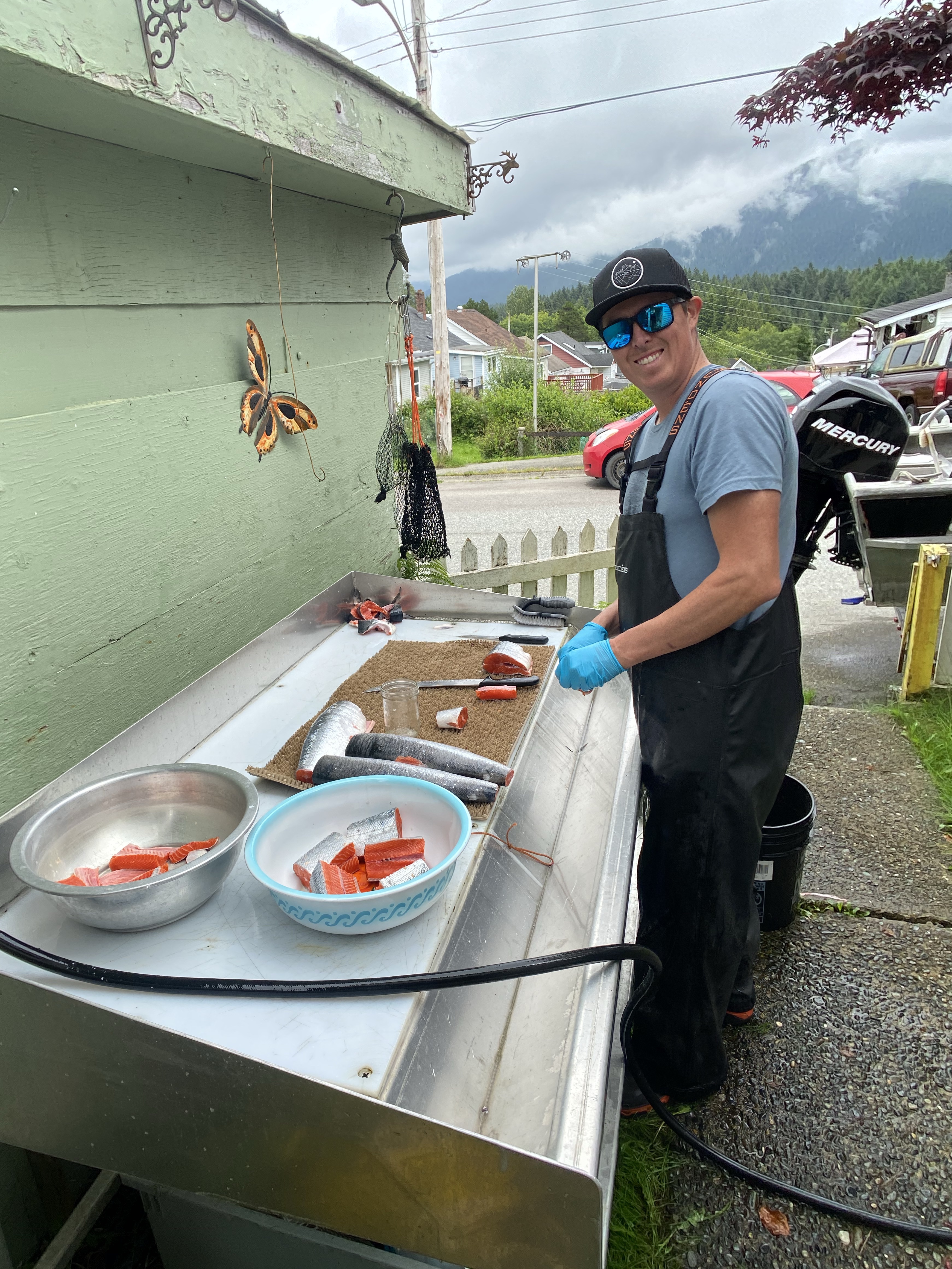 A man and jarred sockeye salmon