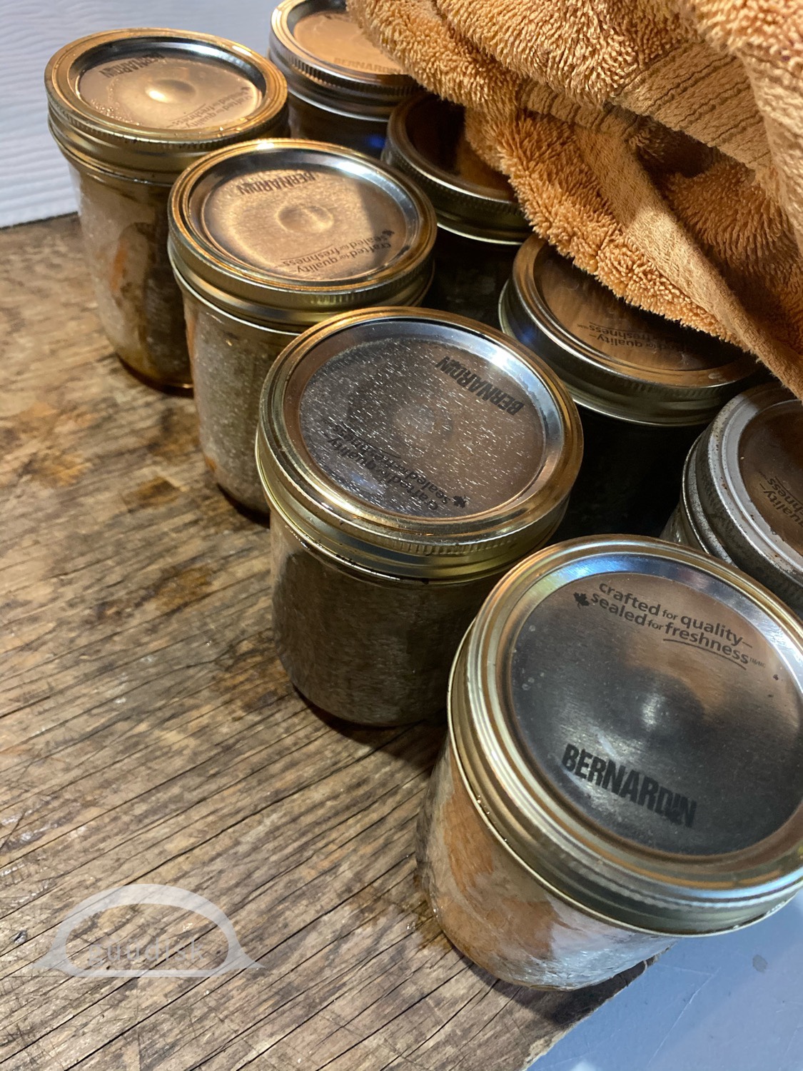 jars on the table and a towel