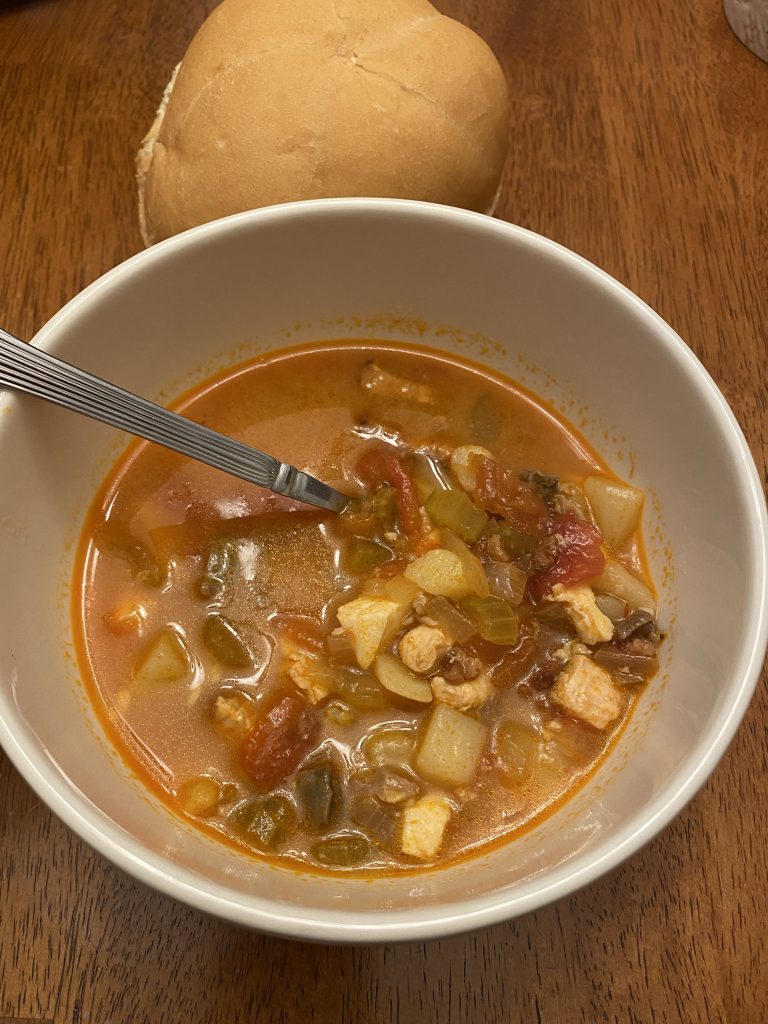 a hearty and delicious tomato based seafood chowder